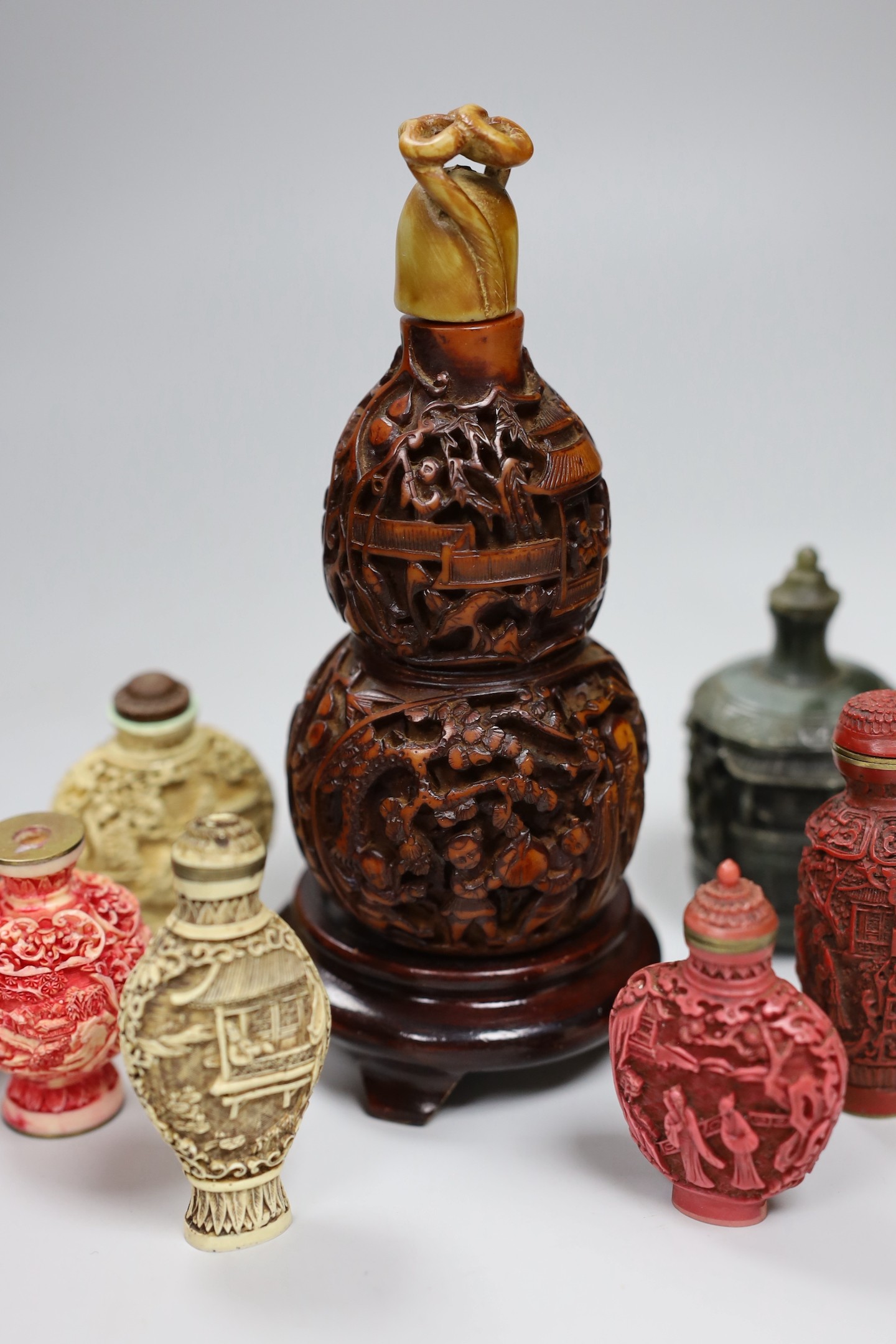 A collection of moulded resin snuff bottles